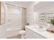 Bright bathroom featuring a shower and tub combination, neutral color palette, and stylish accents at 1020 Sutherland Lane (Lot 41), Lawrenceville, GA 30043