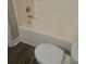 Standard bathroom featuring a tub and toilet, perfect for everyday convenience at 1234 Pinedale Nw Cir, Conyers, GA 30012