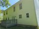Back of the property showing the deck, white siding and trimmed windows at 1234 Pinedale Nw Cir, Conyers, GA 30012