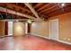 Unfinished basement with exposed ceiling and ductwork, ready for customization and storage at 1721 Hudson Woods Trl, Decatur, GA 30033