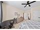 Comfortable bedroom with neutral walls, ample closet space, and a functional desk area for work or study at 2358 New Salem Trce, Marietta, GA 30064