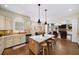 Gourmet kitchen featuring stainless steel appliances, a center island, and an open layout at 2358 New Salem Trce, Marietta, GA 30064
