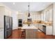 Stylish kitchen with a center island, stainless appliances, and ample cabinet space at 2358 New Salem Trce, Marietta, GA 30064