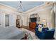 Spacious main bedroom with wood floors, a tv over the dresser, and large windows at 2358 New Salem Trce, Marietta, GA 30064
