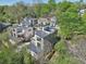 Aerial view showcases modern homes nestled among lush trees, blending contemporary design with natural surroundings at , Atlanta, GA 30310