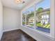 Bright bedroom featuring wood floors and large windows with a view of the street at , Atlanta, GA 30310