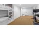 Basement showcasing a bunk bed and workout area creating functional living space at 2032 Grovewood Ct, Cumming, GA 30041