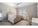 Charming bedroom with a wooden bed frame, shuttered windows, and a hanging chair at 2032 Grovewood Ct, Cumming, GA 30041