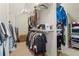 Walk-in closet with ample storage space and organized clothing racks at 2032 Grovewood Ct, Cumming, GA 30041