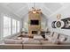 Cozy living room with stone fireplace, vaulted ceiling, and comfortable seating, perfect for relaxing and entertaining at 2032 Grovewood Ct, Cumming, GA 30041