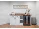 Basement wet bar featuring a mini-fridge, and decor at 2032 Grovewood Ct, Cumming, GA 30041