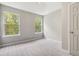 Spacious bedroom with carpet and large windows offering plenty of natural light at 3791 Plantation Mill Dr, Buford, GA 30519