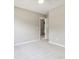 Neutral painted bedroom features carpeted flooring and has a ceiling fan and view into the hall at 3791 Plantation Mill Dr, Buford, GA 30519