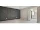 Bedroom featuring statement wall and ensuite bathroom at 3791 Plantation Mill Dr, Buford, GA 30519