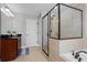 Primary bathroom with a glass enclosed shower and separate tub at 331 Spotted Ridge Cir, Woodstock, GA 30188