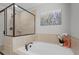 Relaxing bathroom boasts a soaking tub, separate shower, and stylish decor at 331 Spotted Ridge Cir, Woodstock, GA 30188