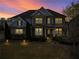 Charming two-story home with a manicured front yard, featuring brick and siding accents at 331 Spotted Ridge Cir, Woodstock, GA 30188