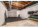 Unfinished basement with exposed ceiling and cinder block walls, ready for your personal touch at 4646 Mountain Creek Ne Dr, Roswell, GA 30075