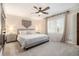 This is a Primary bedroom that has a king bed, ceiling fan, and a large window for natural light at 4646 Mountain Creek Ne Dr, Roswell, GA 30075