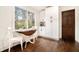 Charming breakfast nook with a round table and view of the backyard at 4646 Mountain Creek Ne Dr, Roswell, GA 30075