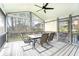Inviting screened porch with seating, ceiling fan, and great views of the backyard at 4646 Mountain Creek Ne Dr, Roswell, GA 30075