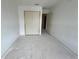 A bedroom with an unfinished floor, a closet, and freshly painted walls at 5114 Arista Dr, Douglasville, GA 30135