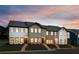 Charming townhomes showcase varied textures, dark window trim, and inviting front entrances at 5114 Arista Dr, Douglasville, GA 30135