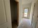 Unfinished hallway with closet and outdoor access at 5114 Arista Dr, Douglasville, GA 30135
