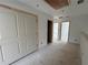 Upstairs hallway featuring multiple doors at 5114 Arista Dr, Douglasville, GA 30135