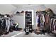 Large walk-in closet with ample storage and organization at 527 Mossycup Dr, Fairburn, GA 30213