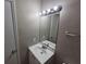 Bathroom with a sink and a mirror at 6301 Creekford Dr, Lithonia, GA 30058