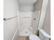 Bathroom with a standing shower and a toilet at 6301 Creekford Dr, Lithonia, GA 30058