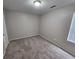 Bedroom with carpeted floors and a window at 6301 Creekford Dr, Lithonia, GA 30058