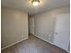 Bedroom with neutral colored walls and carpet flooring at 6301 Creekford Dr, Lithonia, GA 30058