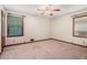 Bedroom with neutral walls, carpet, and a ceiling fan at 1048 Tumblewood Trl, Lawrenceville, GA 30044