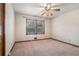 Bedroom with neutral walls, carpet, and a ceiling fan at 1048 Tumblewood Trl, Lawrenceville, GA 30044