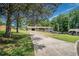 Sprawling property with a well-maintained lawn, long driveway and inviting curb appeal at 1048 Tumblewood Trl, Lawrenceville, GA 30044