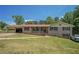 Charming brick home featuring an attached garage and a welcoming front porch at 1048 Tumblewood Trl, Lawrenceville, GA 30044