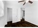 Bright bedroom features hardwood floors, a ceiling fan and includes a closet with ample space at 12042 Brown Bridge Rd, Covington, GA 30016