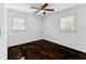 Bedroom features stylish hardwood floors and natural light at 12042 Brown Bridge Rd, Covington, GA 30016