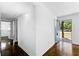 Inviting entryway with hardwood floors and a bright blue front door at 12042 Brown Bridge Rd, Covington, GA 30016