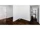 Open hallway showcasing the home's layout, including the bathroom and kitchen entrances at 12042 Brown Bridge Rd, Covington, GA 30016