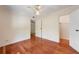 Bedroom with hardwood floors and two closets, including an open closet at 270 Lakemoore Dr # B, Atlanta, GA 30342