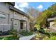Exterior of a two-story home with landscaping, a front door, and a walkway at 270 Lakemoore Dr # B, Atlanta, GA 30342