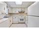 Efficient kitchen with white appliances, cabinetry, and a practical layout at 270 Lakemoore Dr # B, Atlanta, GA 30342
