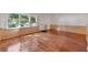Inviting living area with lustrous hardwood flooring and large windows, bringing in plenty of natural light at 270 Lakemoore Dr # B, Atlanta, GA 30342