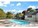 Outdoor swimming pool with a clear blue sky and trees in the background at 270 Lakemoore Dr # B, Atlanta, GA 30342