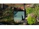 An aerial view highlights the property's well-maintained lawn and the home's green roof at 480 Friar Tuck Cir, Covington, GA 30014