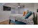 Comfortable bedroom with white shiplap walls and wood-look flooring at 480 Friar Tuck Cir, Covington, GA 30014