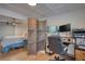 Bedroom features a workspace, a woven screen, and white shiplap walls at 480 Friar Tuck Cir, Covington, GA 30014